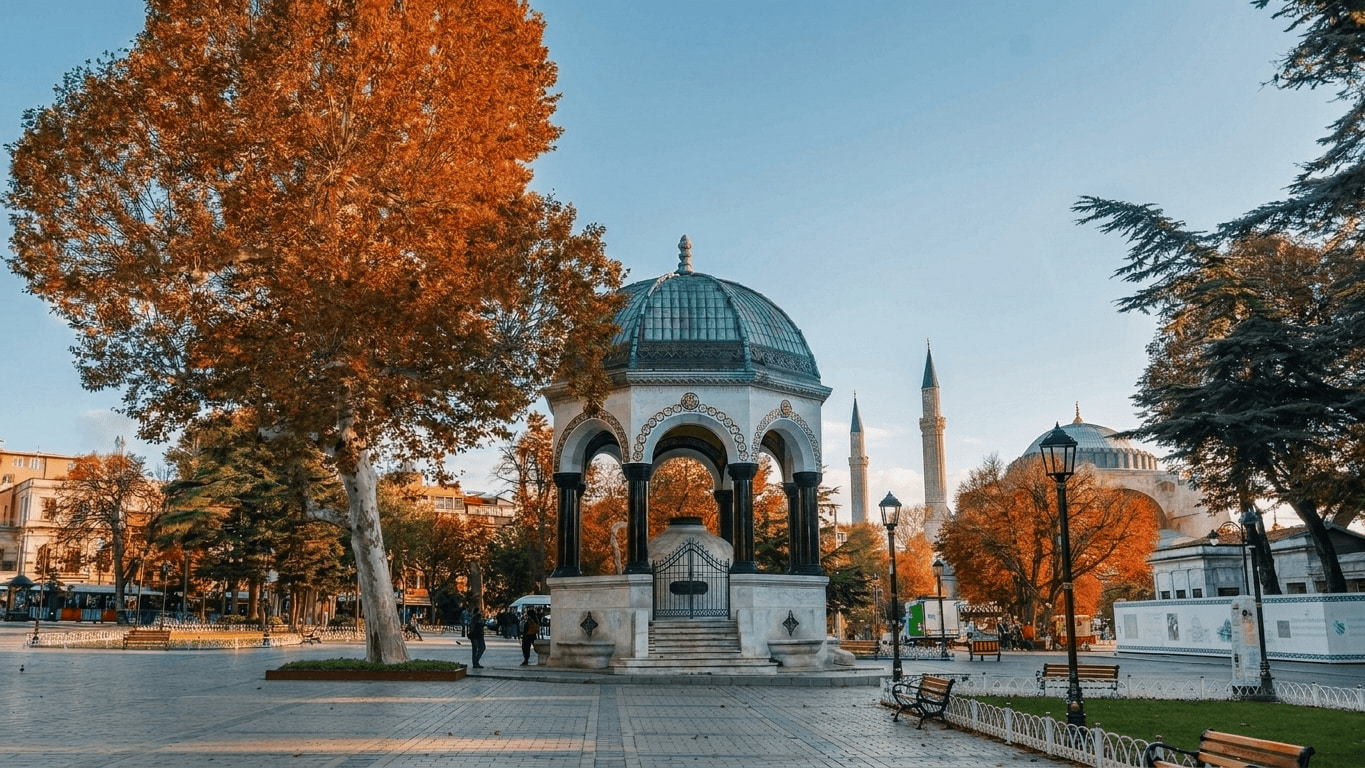 Sultanahmet Square in Istanbul with the German Fountain in the foreground and Hagia Sophia in the background.